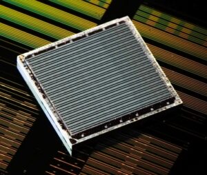 Hybrid Silicon/InP laser chip from Intel. Photo from Intel Press Release.