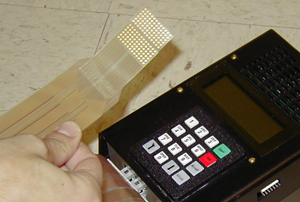 Shown is the Tongue Display Unit version 1. The saliva in our mouths helps it to make excellent electrical contact.